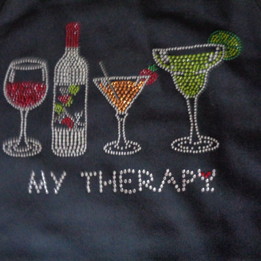 An apron with BLING!  Intricate rhinestone embellishments across the front